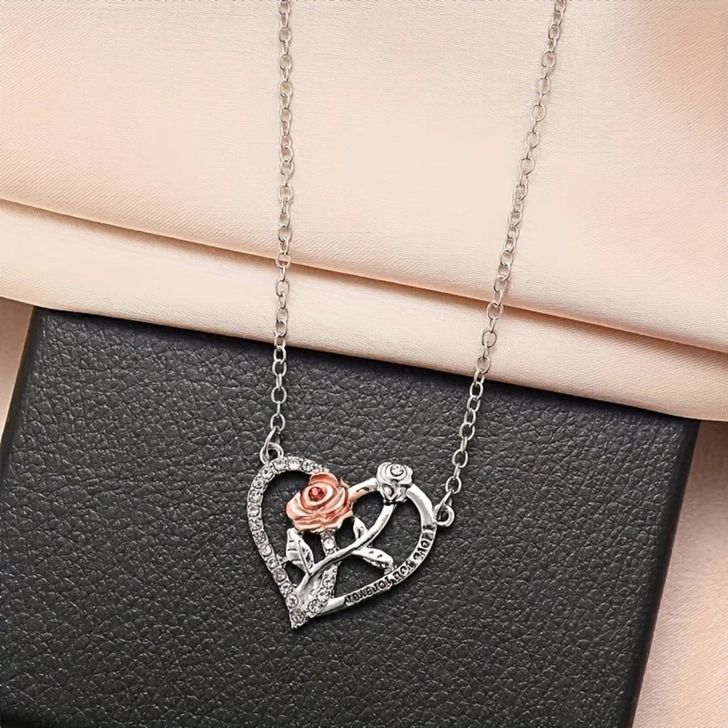 The necklace laid flat, showing the chain and pendant